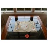 Table with glass bowls & figurines