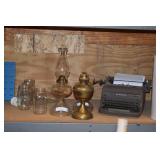 Royal typewriter and vintage hurricane lamps