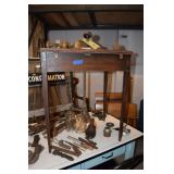 Antique table, tools and door knobs