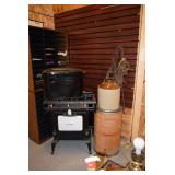 Antique cast iron stove, firewood bucket