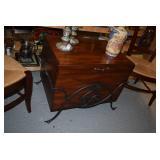 Chest in wrought iron holder