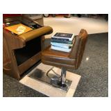 arcade game/chair/books