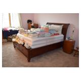 Bed with Assorted Linens