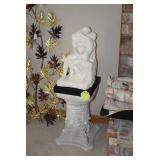Ceramic sculpture on stand