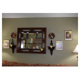 Wooden shelf with mirror, sconces, & wall art