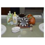 Soaps, Mirror, and Brush