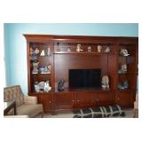 Display Cabinet, Eskimo Collectible Figures, & Flat Screen TV