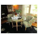 table with four barrel chairs