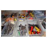 Variety of tools (Wrenches, pliers, socket wrenches, box cutters, tape measures, wire cutters)