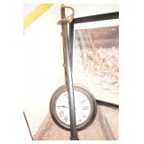 Sword, clock, bike picture