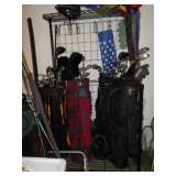 golf clubs and fishing gear