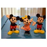 Mickey Mouse (two ceramic figurines - one waving hello and one with hand behind back and hand out) a
