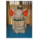 Dumbo - "Patented Turnabout 4 in 1 - Walt Disney" on bottom - Face paint in good shape, glazing is c