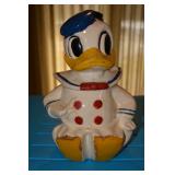 USA, Circle with a crown at top, and word Celebrate and Reg US Patent Off embedded in ceramic; may h