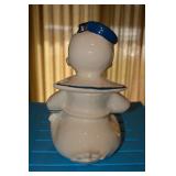 USA, Circle with a crown at top, and word Celebrate and Reg US Patent Off embedded in ceramic; may h