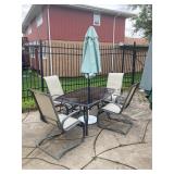 Outdoor table, 4 chairs and umbrella 