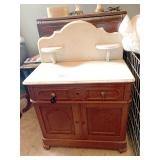 Antique cabinet with marble top and backsplash