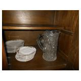 glass pitcher and china