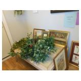 coffee table plant and pictures 