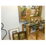 glass nesting tables and paintings 