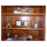book shelf with toys