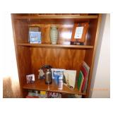 book shelf with misc. items