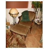 Armchair with ottoman and standing globe