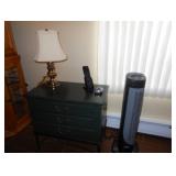 chest of drawers and lamp 