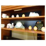 decorative eggs and small mantle clock 