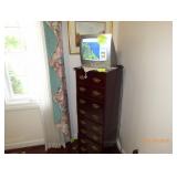 dresser and small television 