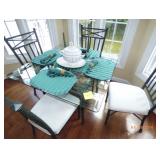 glass top table and four chairs 