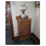 cabinet and lamp with glass shade 