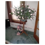 plant stand with floral arrangement 