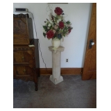plant stand and floral arrangement 