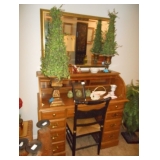 roll top desk and plants 