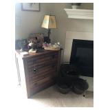 antique lamp & bells on chest