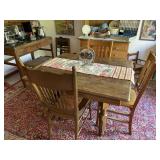 table & 4 unmatched chairs