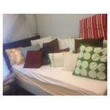 Pillows and twin beds and linens