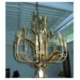 ORIGINAL TOM GREENE BRUTALIST CHANDELIER WITH HAND TORCHED PATINA.