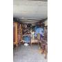 Estate items vintage and antique furniture overflow