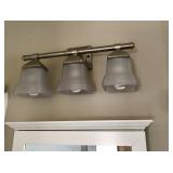 Bathroom cabinets, pedestal sink, lighting