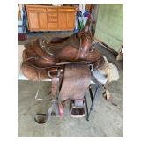 Tooled leather saddle