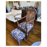 Antique, ornate armchair with matching foot stool, carved back, Empire Period.