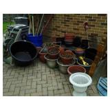 HOSE REELS, HOSES, GARBAGE CANS, LARGE PLASTIC POND OR FOUNTAIN CONTAINER, LOTS OF DIFFERENT POTS