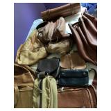 many vintage leather bags, briefcases, satchels, wallets, etc