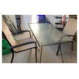 #67 Glasstop rectangular table w/2 chairs