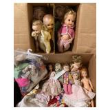 #95- 2 boxes of dolls and clothes some identified$20