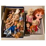 #96- 2 boxes of small articulated dolls $22