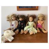 American Girl dolls and bin of clothes