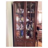 pair of matching glass cabinets